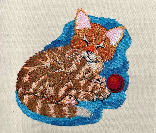 kitten with ball embroidery design