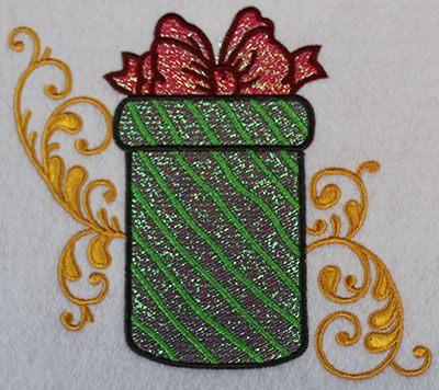 Embroidery Design: Christmas present with swirls 6.68w X 5.96h