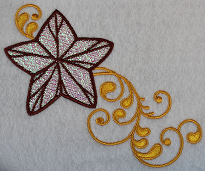 Embroidery Design: Christmas star with swirls 5.2w X 4.38h