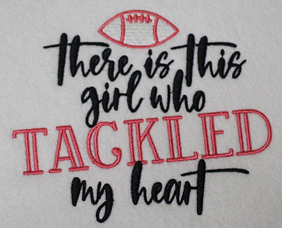 Embroidery Design: Girl Tackled Heart Lg 5.36w X 4.51h