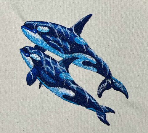 Killer whales embroidery design
