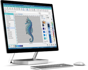 a desktop computer with a drawing of a seahorse on the screen.