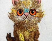 Cuddly orange cat embroidery design