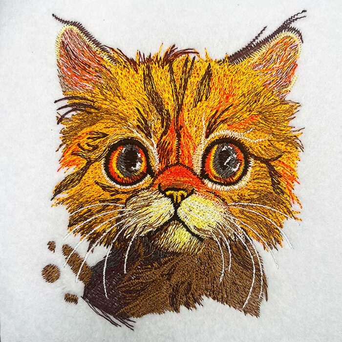 Cuddly orange cat embroidery design